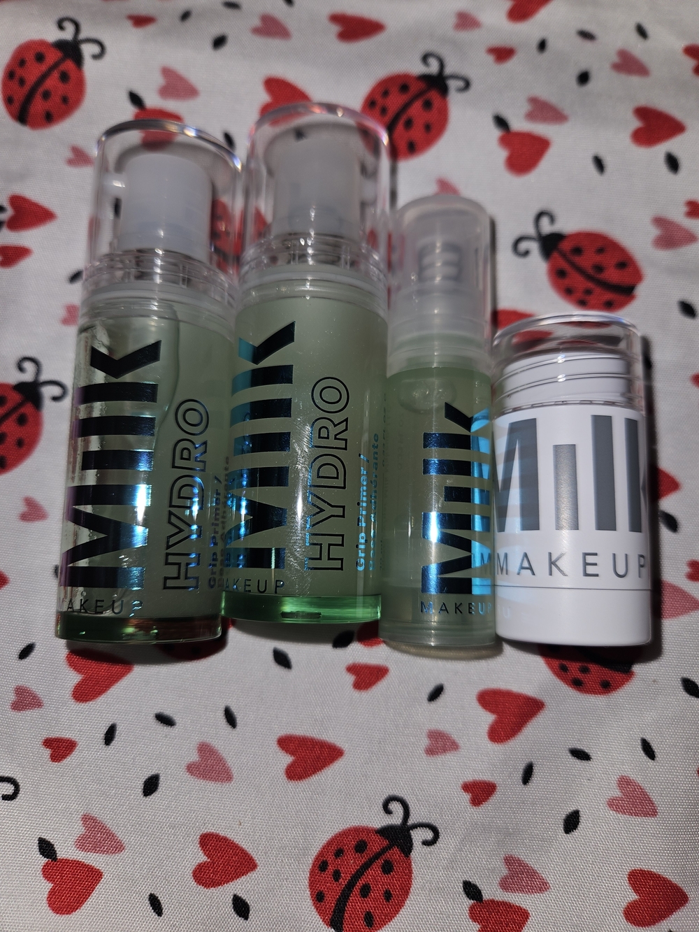 Lot of 4; 3 Milk Makeup Hydro Grip Primer and highlighter in LIT